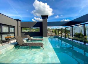 Loft com garagem, piscina e coworking no centro606