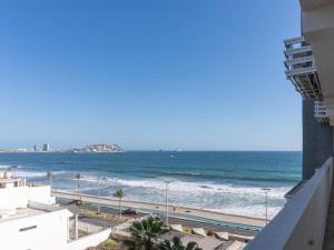 On the Malecón with ocean, lagoon & pool