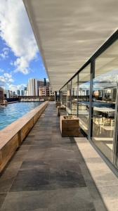 POX - Sky Plaza Italia Studio - Pool, Gym & Prime Location