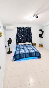 Habitación con AC y Proyector cerca de la Playa