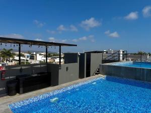 Cerca de la Playa con Alberca en Roof By GPSRenta
