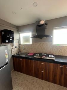 The Cozy Chapter Homestay, 2 BHK Premium Luxury Unit Near Downtown Hospital & GS Road