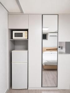 AngelD-20 minutes to Gangnam! Hotel-style bedding, OTT service, Cooking, Laundry, the most reasonable choice for Seoul travel & business!