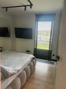 Apartment Premium, MSPO 2026, Free Parking, Invoice