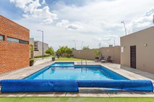 Casa Colorin by Cosmos Homes