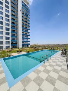 15 Mins to JKIA and SGR #1BR in Syokimau #Free Pool, Gym and Park View