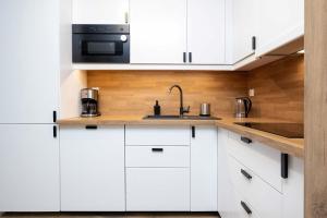 Nowoczesny Apartament Planty z 2 Balkonami blisko Rzeki by Noclegi Renters