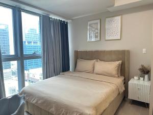 Cozy 1Bedroom with City View in Uptown BGC