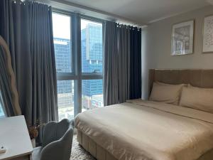 Cozy 1Bedroom with City View in Uptown BGC