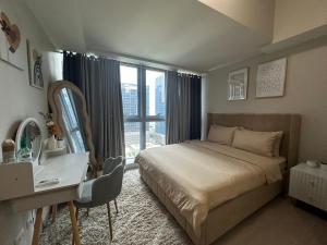 Cozy 1Bedroom with City View in Uptown BGC