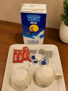 Nova Stay Premium Stay Near Pari Chowk and Expo Mart