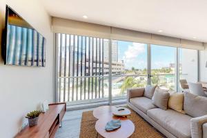 2BR Puerto Cancun with Rooftop Pool Gym & Marina