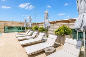 2BR Puerto Cancun with Rooftop Pool Gym & Marina