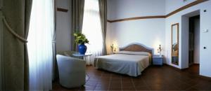 Classic Dreibettzimmer mit Gartenblick