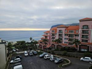 Pool, sea and sunset view flat