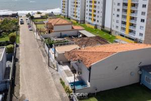 Casa em condo. a passos do mar ONI0002
