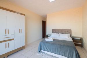 Casa em condo. a passos do mar ONI0002