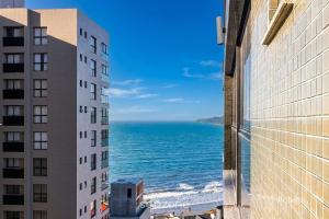 Apto c churrasq. 90m da Praia de Perequê RIH0902