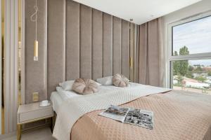 Comfortable Apartment with a Balcony & Air Conditioning in Gdańsk by Noclegi Renters