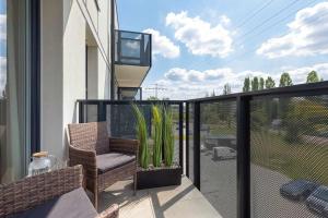 Comfortable Apartment with a Balcony & Air Conditioning in Gdańsk by Noclegi Renters