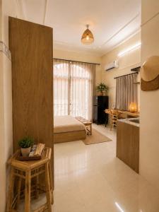 Nhà Mình homestay - Quiet Balcony Rooms in District 3