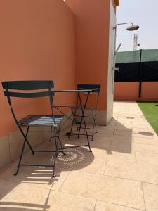 Elegant 1BR Apartment with Terrace & Rooftop Pool