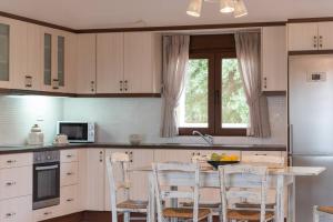 Family Villa Rousa in Rethymno with Pool, BBQ and Kids Area