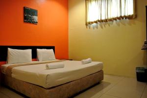 Wau Hotel & Cafe