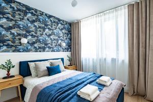 Reymonta Three-Bedroom Apartment near Metro by Mia