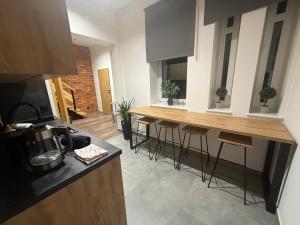 Stylowy Loft Apartament z Antresolą w Centrum Gorzowa
