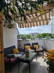 Luxurious, floral penthouse terrace and sauna