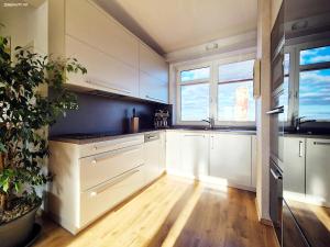 Luxurious, floral penthouse terrace and sauna
