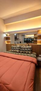 Apartemen Transpark Cibubur by MayRa Property