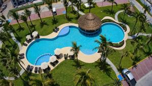 Club de Playa y terraza con asador en planta baja - Dream Diamante, Acapulco Diamante