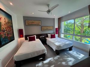 Karon Beachfront Apartment 711
