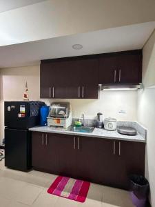 Amigos place in San Lorenzo makati 12-J near airport,mall