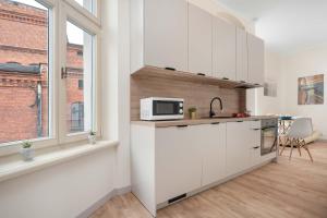 Przytulne Studio w Kamienicy Blisko Rynku by Noclegi Renetrs