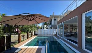 Casa Luxuosa em Riviera Condomínio Hang Roa