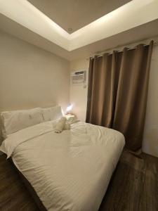 Aikas Cozy 1BR Retreat, Walk to IT Park, Fast Wifi