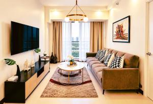 Elegant 3BR Condo with Resort Pools Near BGC Taguig