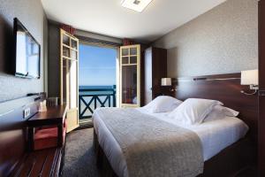 Hotels Ambassadeurs Logis Hotel : photos des chambres