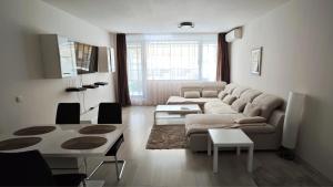 Apartment Garden - two large terraces with hanging chairs and sunset view