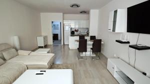 Apartment Garden - two large terraces with hanging chairs and sunset view