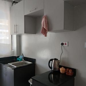 Arc II Residence, Wangige - Cozy Studio with Pool and Gym
