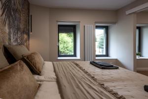 City Break Apartment by Fengshui4u w centrum Łodzi z osobną sypialnią i bezpłatnym parkingiem