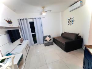 Flat lindo a 120 metros da praia de Riviera de São Lourenço até 4 pessoas