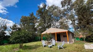 Casa de huespedes en terreno compartido