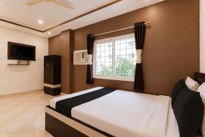 Hotel O Ghosh