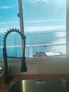 Cabaña con vista al mar