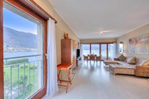 Emotion Lake Lugano with direct lake access and shared pool - Happy Rentals